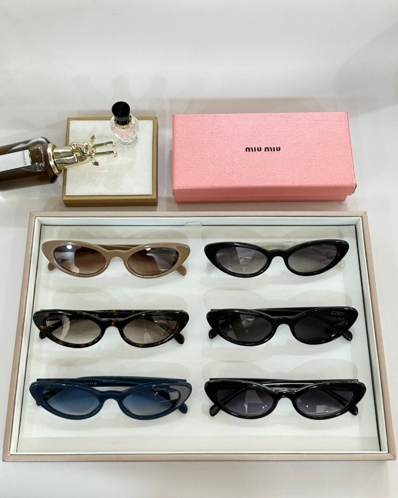 Miu miu Sunglasses